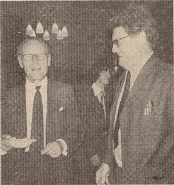 Celebrating his 50 years as a bellringer was Mr. Patrick A. Cannon, when he attended the Civic Reception for the Central Council members at Guildford’s Royal Grammar School on Bank Holiday Monday. His celebration dish? - fruit salad and fresh cream! Peter Border, seen here with Pat, was en route to select a dish of his own choice during the buffet meal